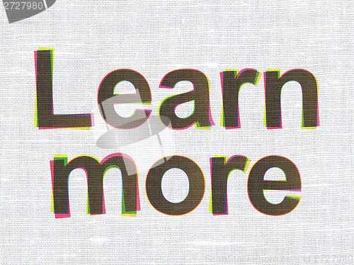 Image of Education concept: Learn More on fabric texture background