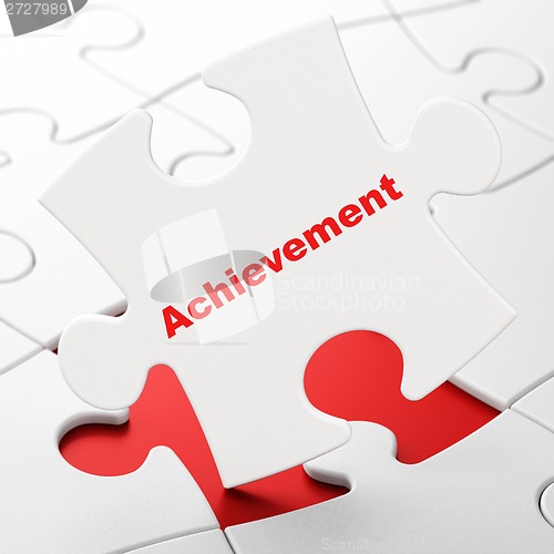 Image of Education concept: Achievement on puzzle background