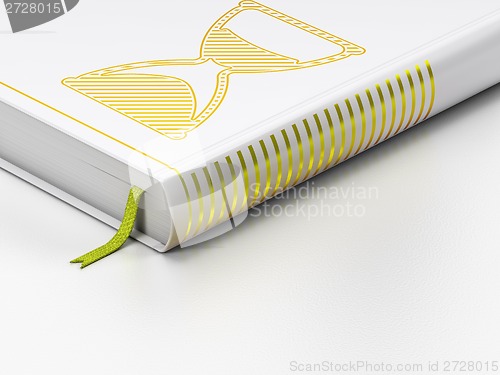 Image of Timeline concept: closed book, Hourglass on white background