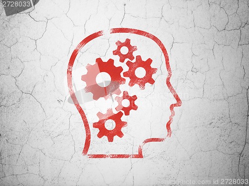 Image of Education concept: Head With Gears on wall background