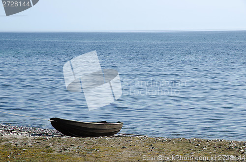 Image of Old rowing boat at seaside