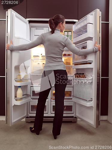 Image of woman looking for something to eat