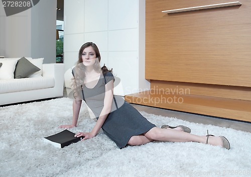 Image of a young girl at home relaxing