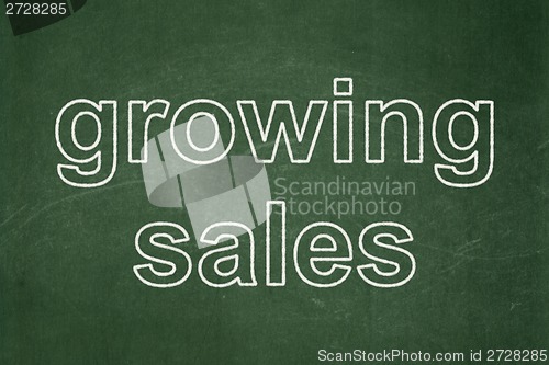 Image of Business concept: Growing Sales on chalkboard background