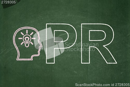 Image of Advertising concept: Head With Lightbulb and PR on chalkboard background