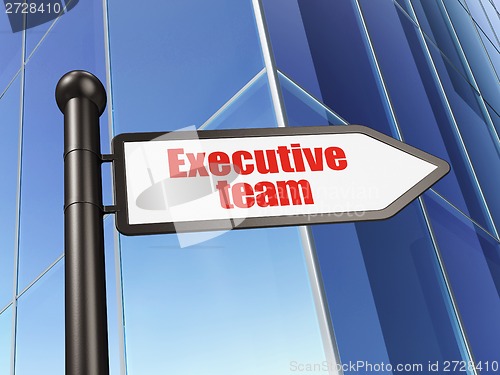Image of Finance concept: sign Executive Team on Building background