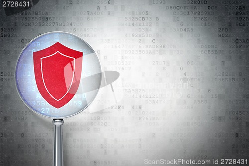Image of Privacy concept:  Shield with optical glass on digital background