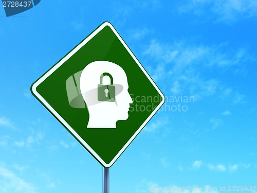 Image of Finance concept: Head With Padlock on road sign background