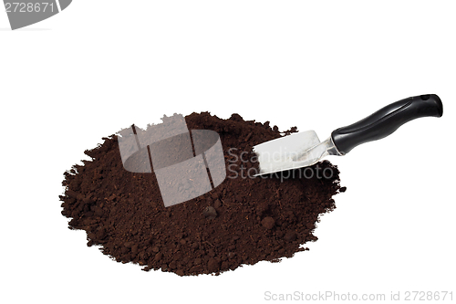 Image of Trowel and soil