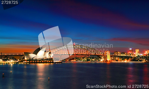 Image of Sydney Opera House and Harbour Bridge at sundown