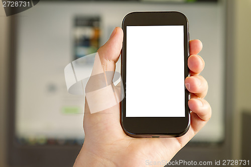 Image of Man's Hand holding a Smartphone