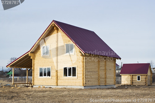 Image of New log house and the vaporarium