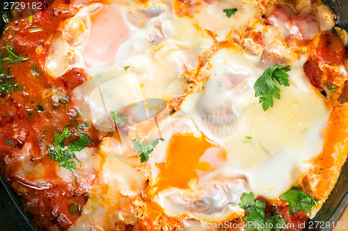 Image of Eggs in purgatory or shakshouka close up