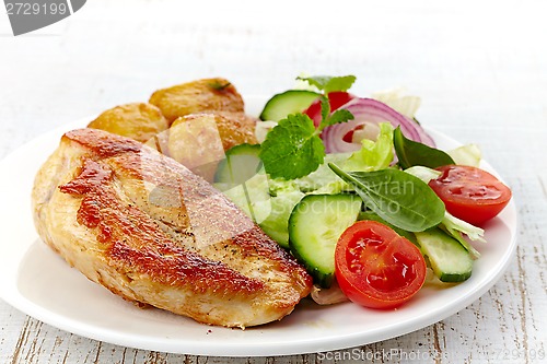 Image of roasted chicken fillet and vegetable salad