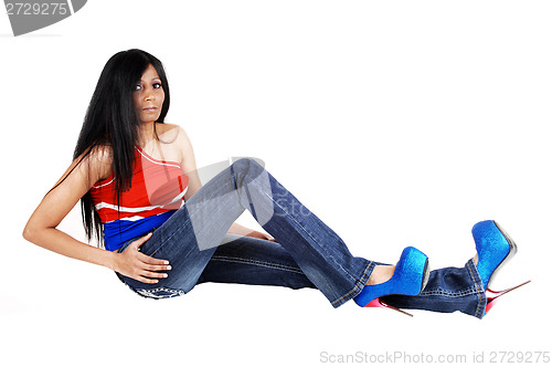 Image of Girl lying on floor.