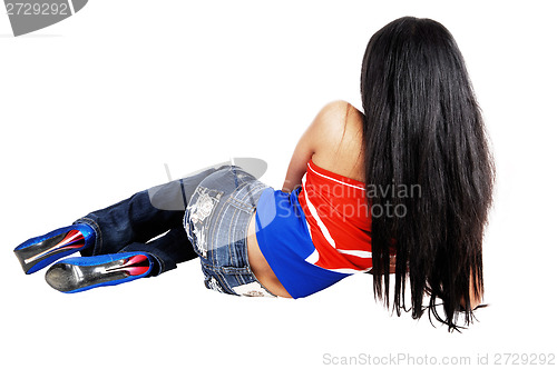 Image of Girl lying on floor.