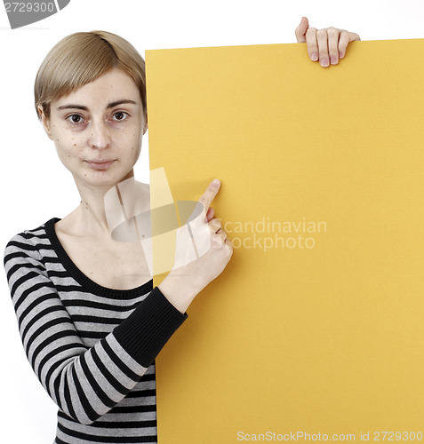 Image of Woman holding a paper