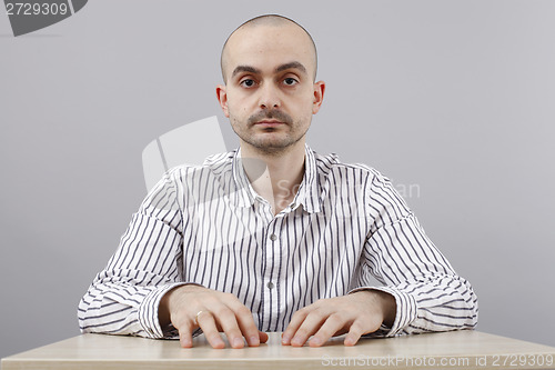 Image of Man at desk