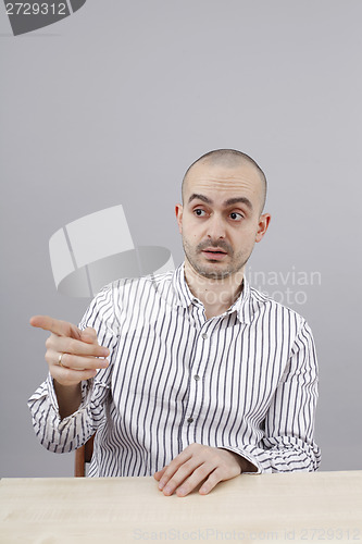 Image of Man at desk