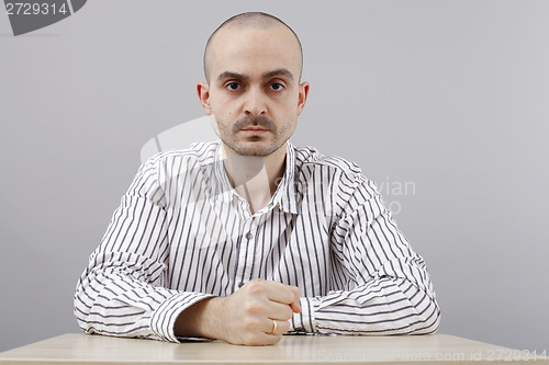 Image of Man at desk