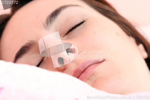 Image of Beautiful young woman sleeping.