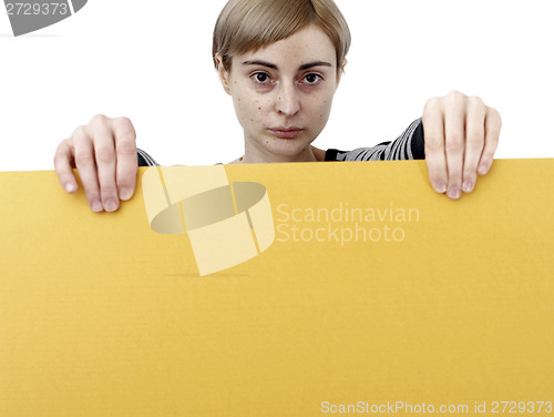 Image of Woman holding a paper