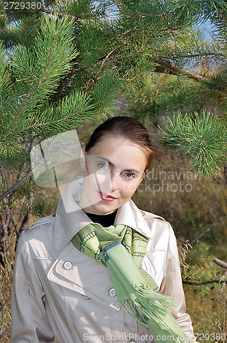 Image of  woman in a raincoat