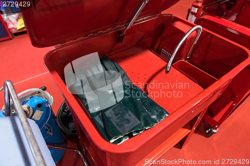 Image of Protective gloves in red box