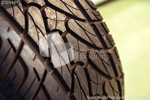 Image of New car tyre closeup photo