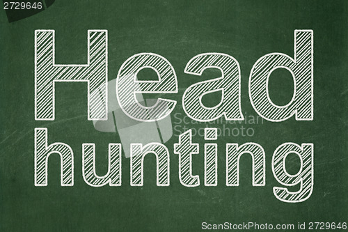Image of Business concept: Head Hunting on chalkboard background