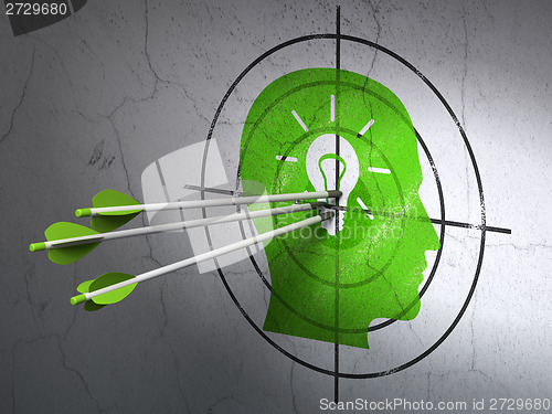 Image of Business concept: arrows in Head With Light Bulb target on wall background