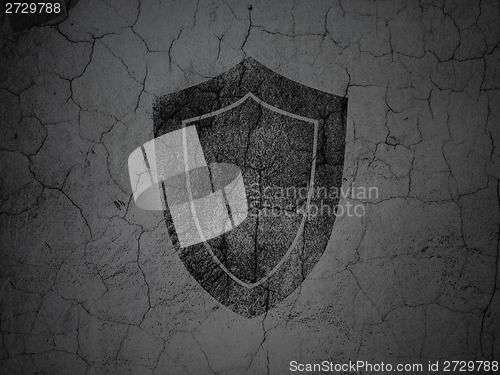 Image of Safety concept: Shield on grunge wall background