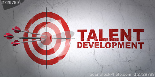 Image of Education concept: target and Talent Development on wall background