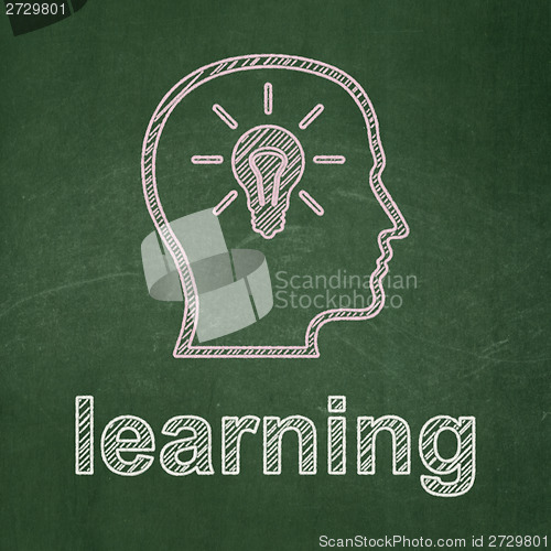 Image of Education concept: Head With Lightbulb and Learning on chalkboard background