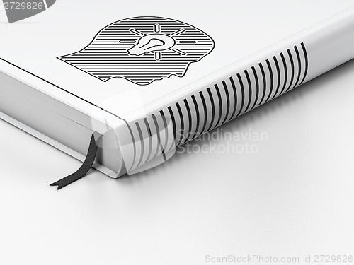 Image of Information concept: closed book, Head With Light Bulb on white background