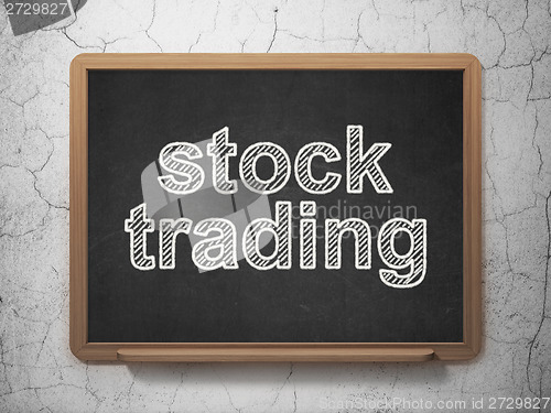 Image of Business concept: Stock Trading on chalkboard background