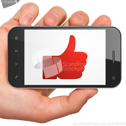 Image of Social media concept: Thumb Up on smartphone