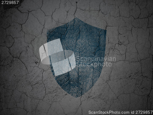 Image of Safety concept: Shield on grunge wall background