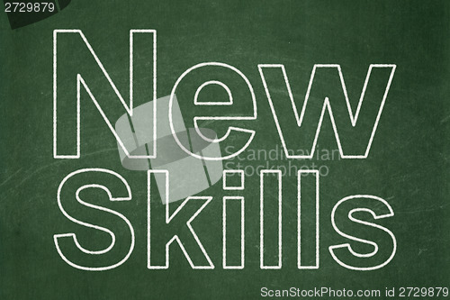 Image of Education concept: New Skills on chalkboard background