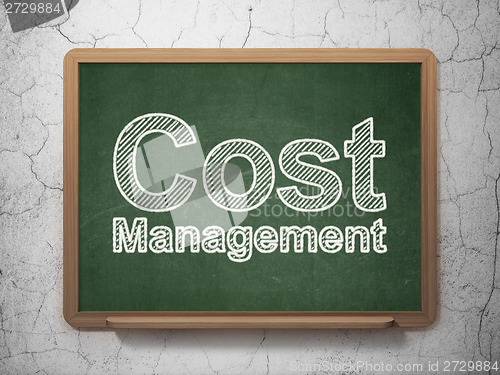 Image of Business concept: Cost Management on chalkboard background