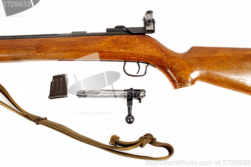 Image of detail of old bolt action rifle isolated