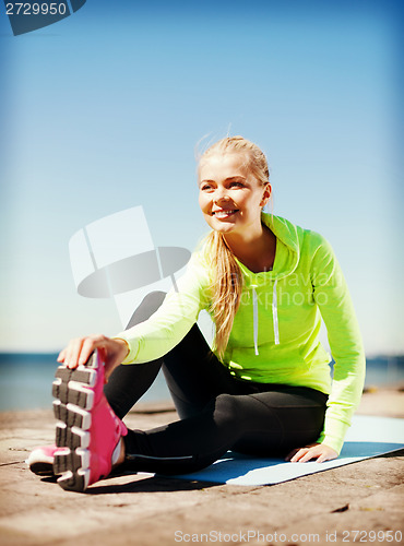 Image of woman doing sports outdoors