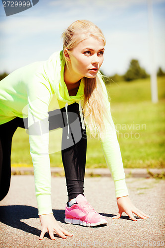 Image of woman doing running outdoors