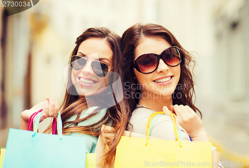 Image of girls with shopping bags in ctiy