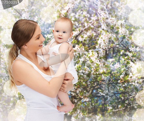 Image of happy mother with adorable baby