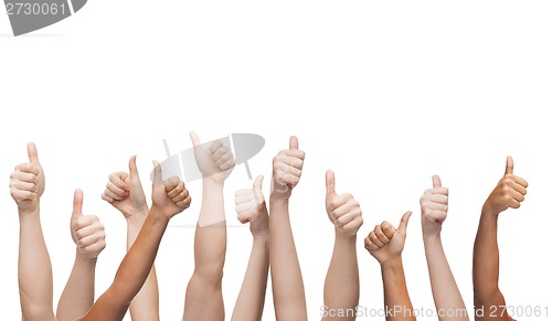 Image of human hands showing thumbs up