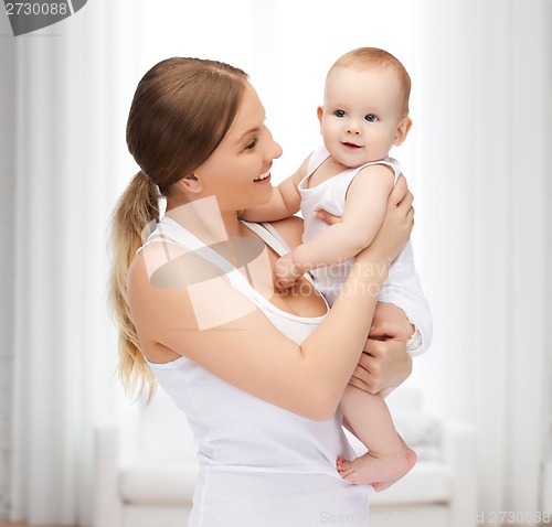 Image of happy mother with adorable baby