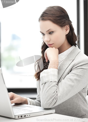 Image of businesswoman with laptop