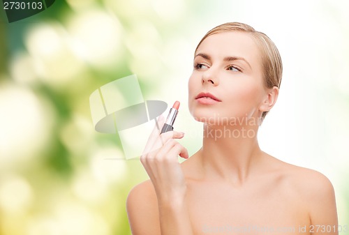 Image of beautiful woman with lipstick