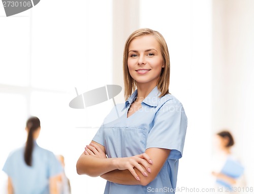 Image of smiling female doctor or nurse